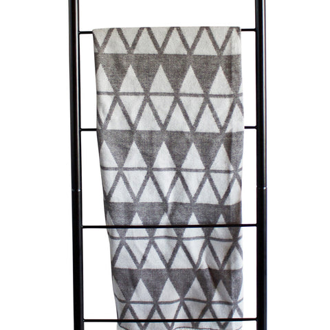 Black metal store blanket ladder